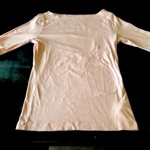 A soft blush baby pink quarter length sleeve shirt